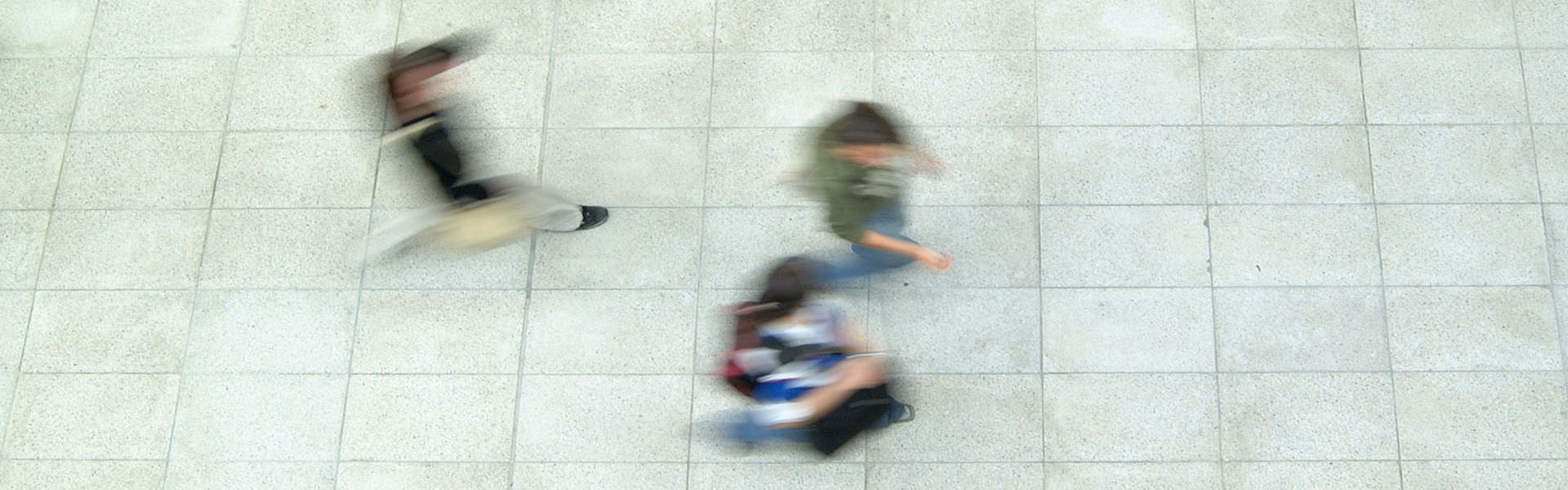 People in motion walking in the O'Brien Science Centre taken from above