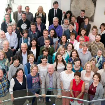 A picture from the top showing UCD staff who are looking up