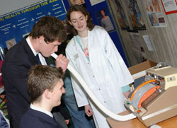 Hugh Walsh and Paul Fannan from Clongowes with Catherine Sweeney (1st year Medical student).