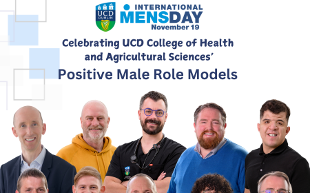 Group of men smiling to camera with International Men's Day logo