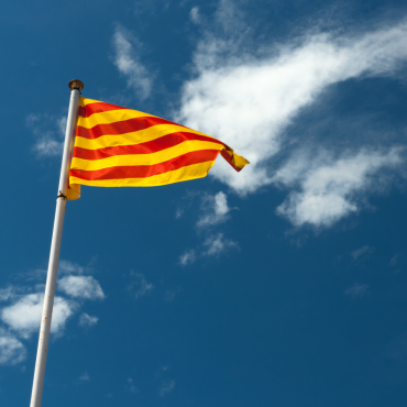 Catalan Flag in front of blue skies