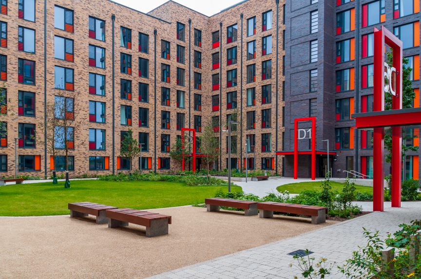 Exterior shot of the UCD Village accommodation with a cloudy sky overhead