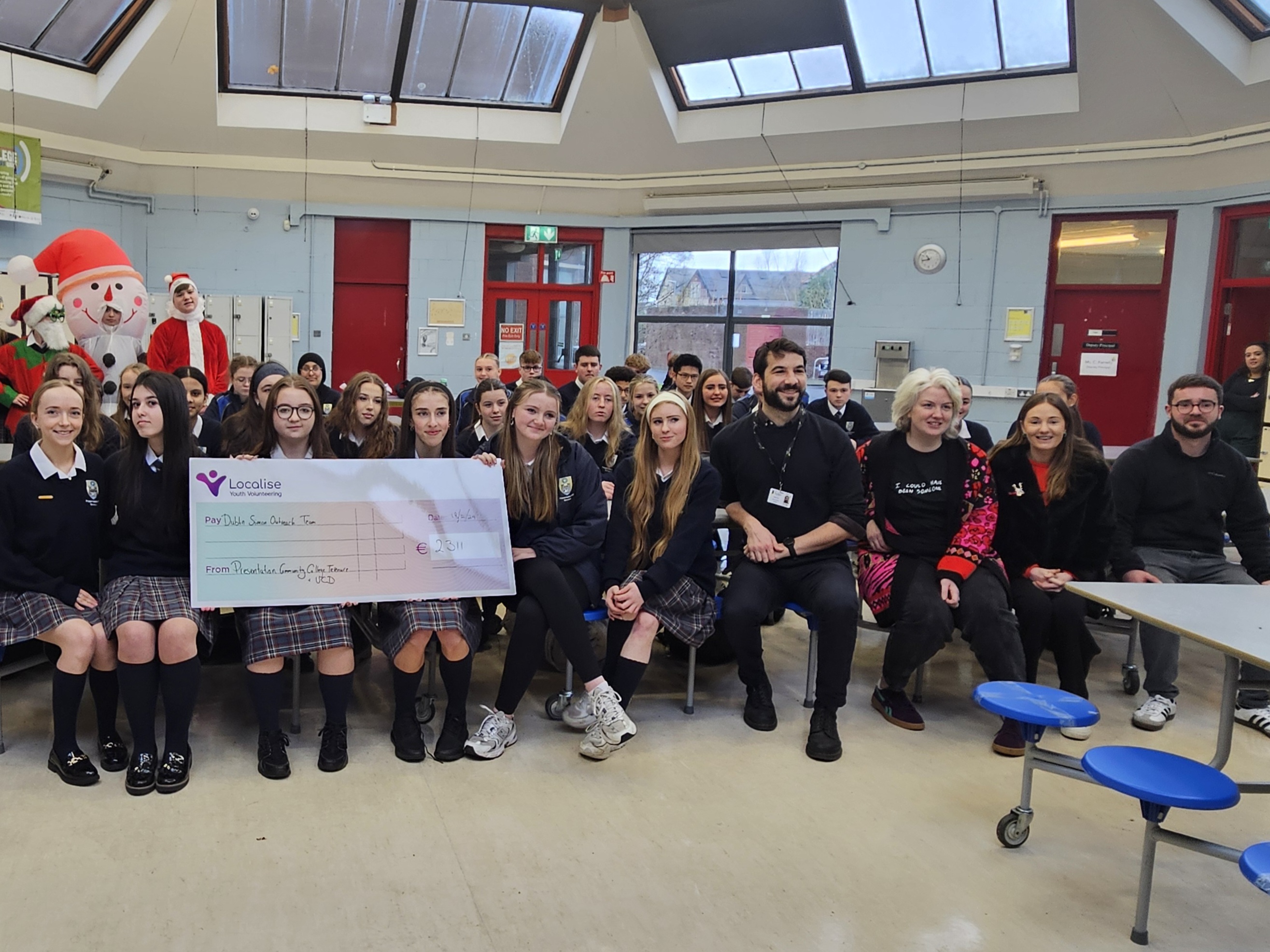 School Students handing over cheque to Dublin Simon Community for Appeal