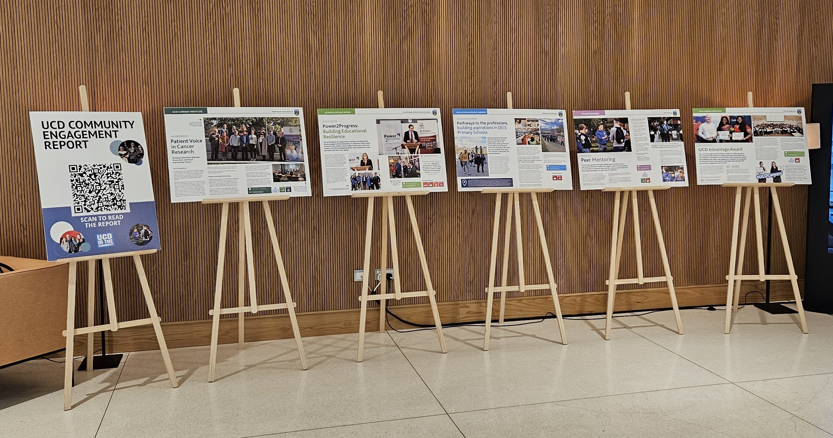 A display of stories on easels pictured in the UCD University Club